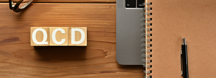 What is the "Hybrid Process" that achieves QCD optimization